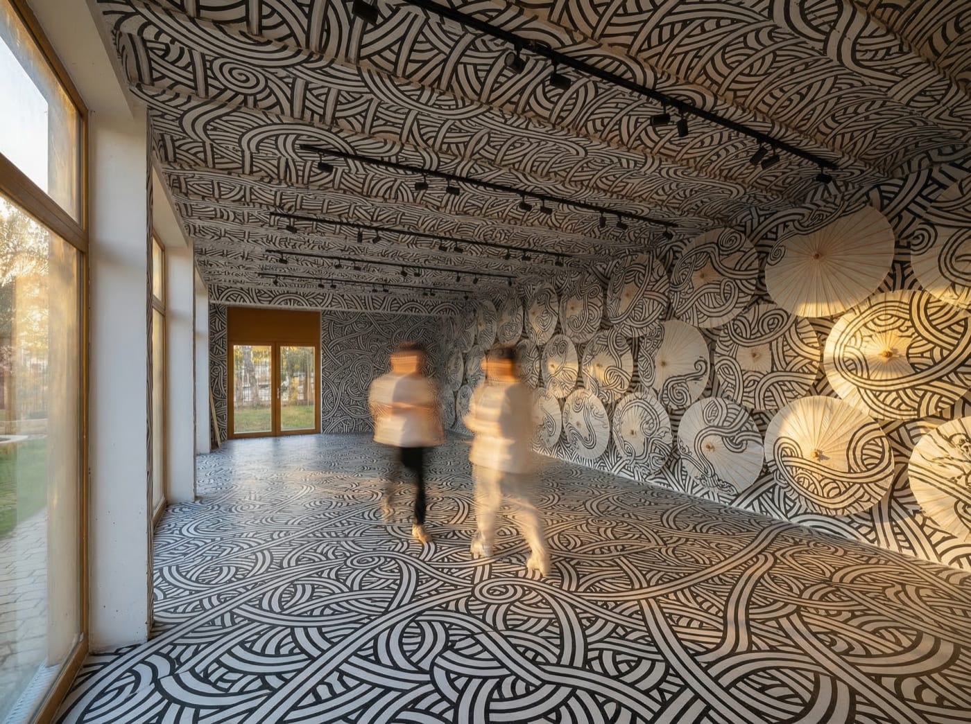 Visitors crossing the immersive room of Ondes & Lignes at LabMusée